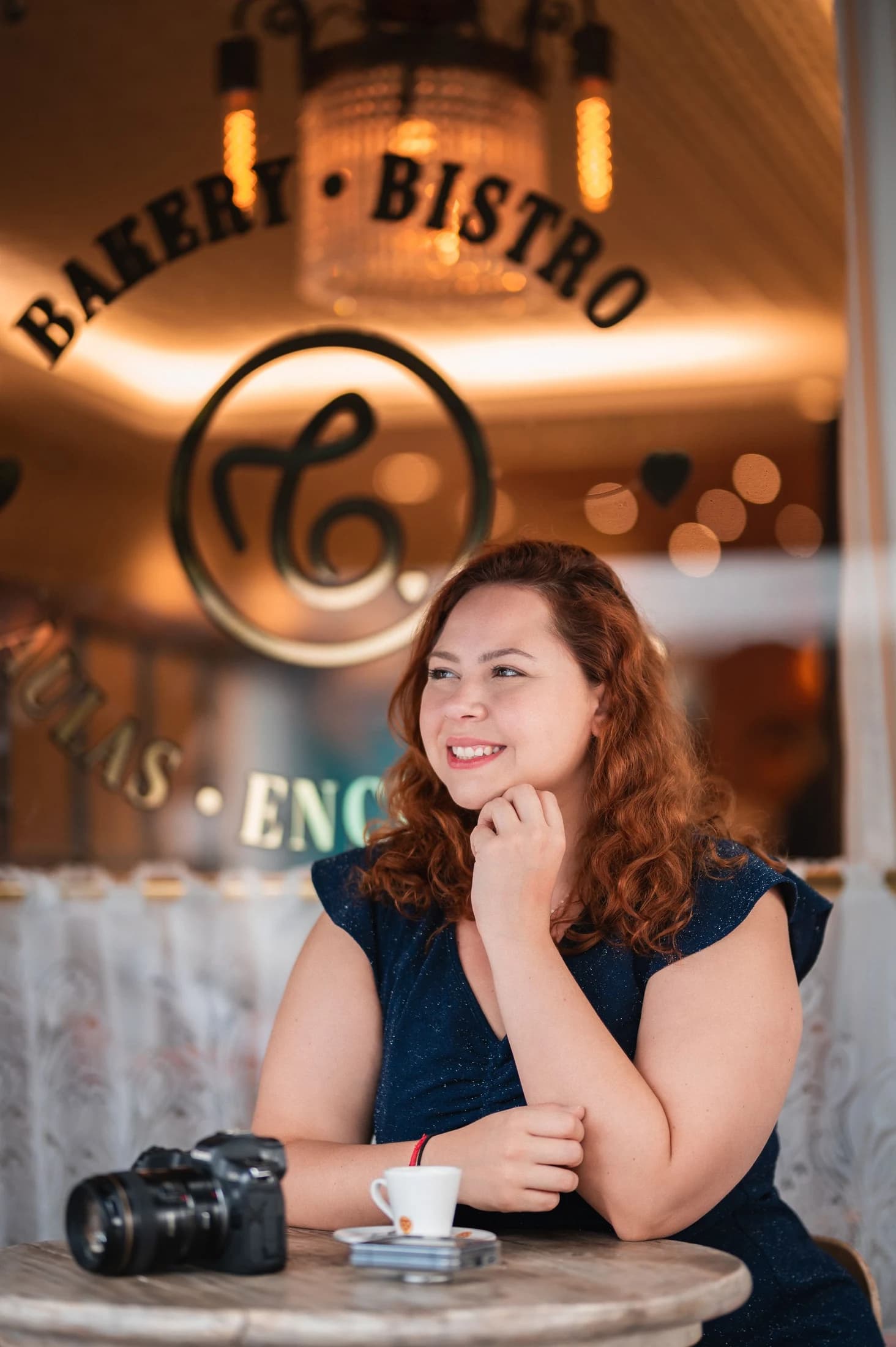A content creator with her camera at a Los Angeles café